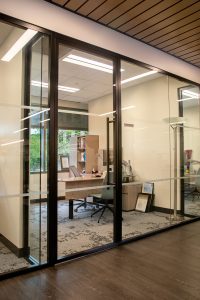 Hallway: Single Glazed walls with Framed Pivot Doors